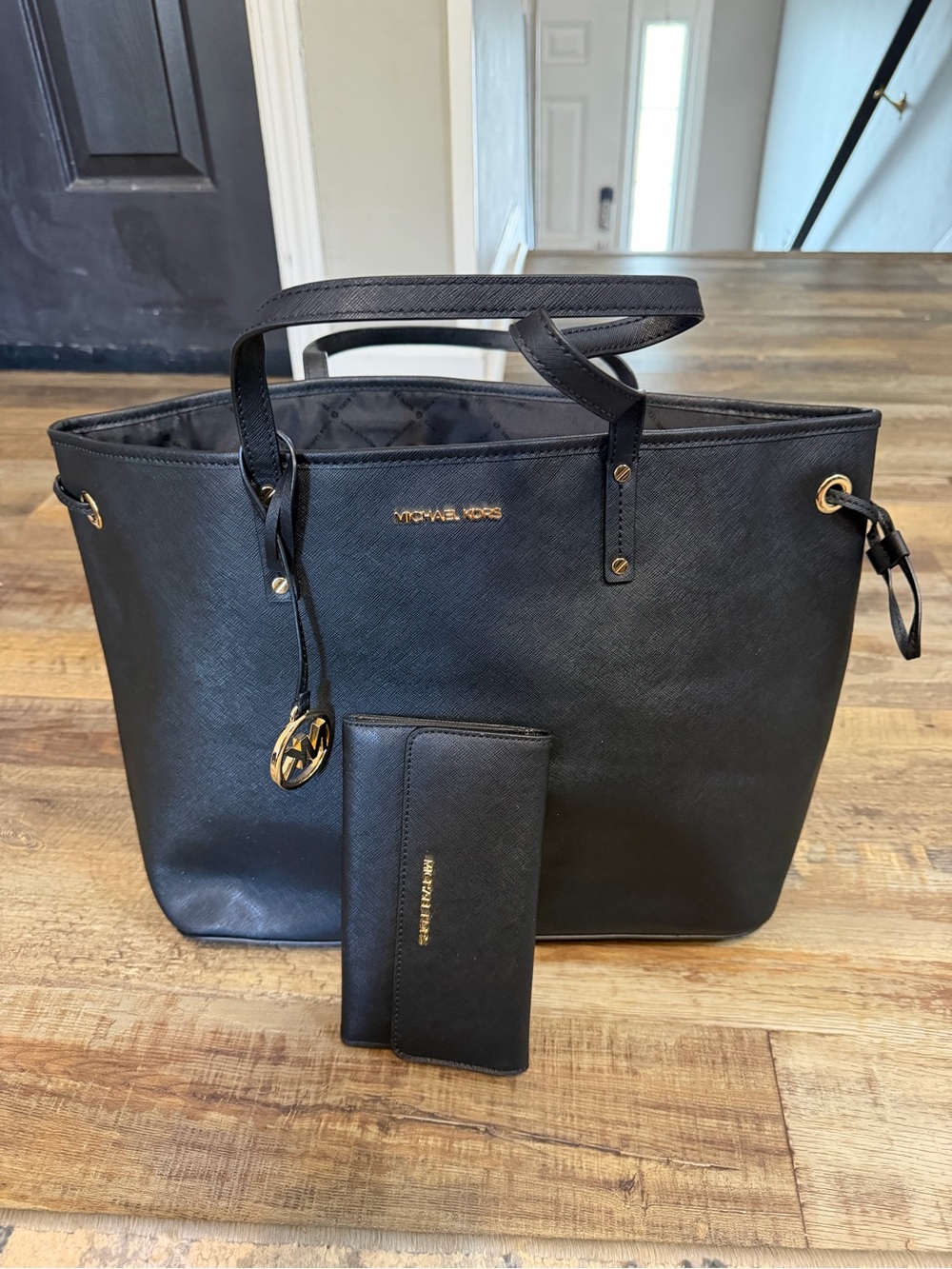 Michael Kors Black Leather Tote with Matching Wallet and Gold Accents
